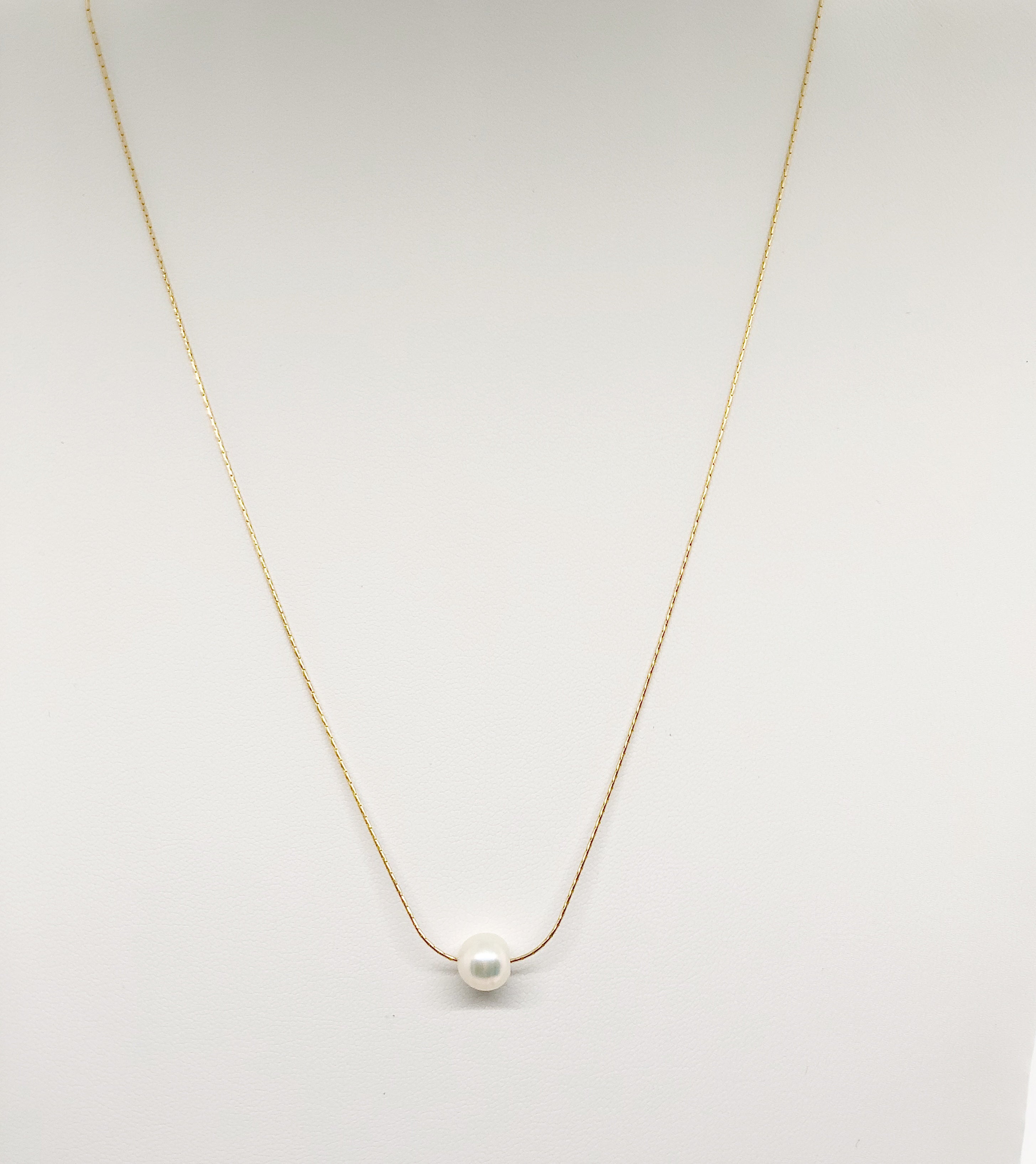 Floating Pearl Necklace on Gold